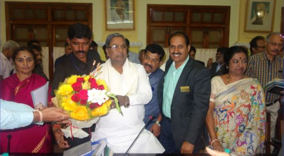 Karnataka Chief Minister & IAS Officer with PIA President